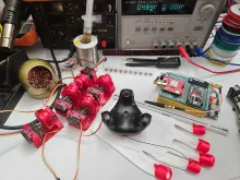 Components of VR Haptic Gloves laid out on a table.